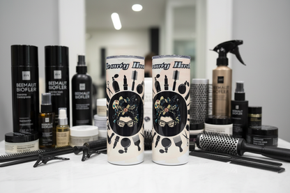 Beauty Hustler tumblers surrounded by hair products