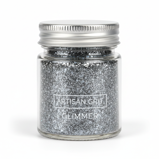 Triple J Gray glitter in container showing mixed size flakes